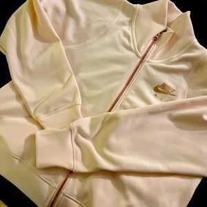 Nike sweatshirt, beautiful rose gold color, never worn! Smoke free home!